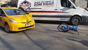 cyclist struck by underinsured taxi
